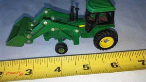 lot 89 image: J.D. Bucket Tractor