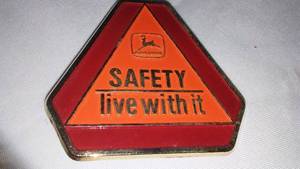 lot 109 image: John Deere Belt Buckle Safety - Live With It,