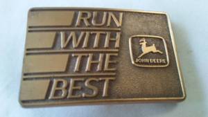 lot 184 image: John Deere Belt Buckle Run With The Best