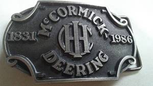 lot 268 image: McCormick Deering Belt Buckle 155th Anniv