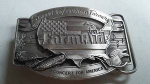 lot 279 image: Farm Aid Belt Buckle, 1985 Concert For America