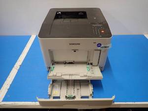 Samsung&nbspCLP-680ND Printer  25ppm  NO HD  scuffs on printer  includes CAB-AC power  not tested