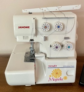 lot 74 image: Janome Magnolia 7034D Differential Feed Serger with Manuals