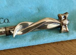 lot 34 image: Tiffany & Co. Sterling Ribbon Pen
