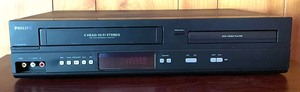 lot 219 image: Philips VCRDVD Player with Manual