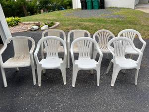 lot 229 image: 8 Plastic Stacking Chairs
