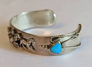 lot 443 image: Pair of Sterling and Turquoise Cuff Bracelets
