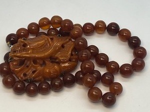 lot 458 image: Vintage Beaded Necklace with Carved Pendant