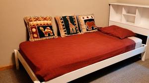 lot 52 image: White Twin Bookshelf Bed Frame