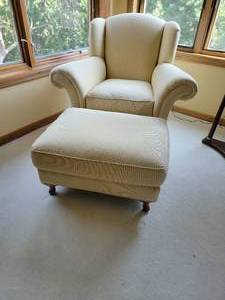 lot 22 image: Pin Striped Butter Yellow Club Chair and Ottoman by Freestyle