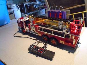 New Bright remote control fire truck. Lightly used. As shown.