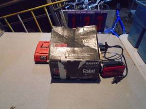 Camcorder with 20 volt charger. As shown.