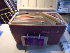 Coleman cooler with albums. Big band, polka, etc. As shown.