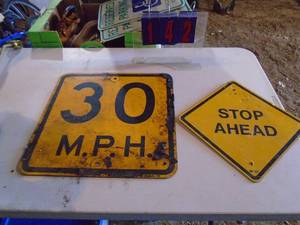 Qty of 2 street signs. As shown.