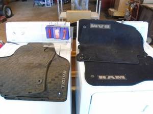 Qty of 4 auto floor mats. As shown.