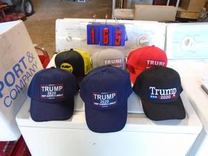 Box of 2020 Donald Trump hats & stickers. As shown.