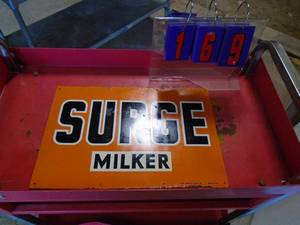 Old Surge milker sign. As shown.