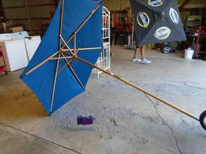 Miller Lite wood frame cloth umbrella. As shown.