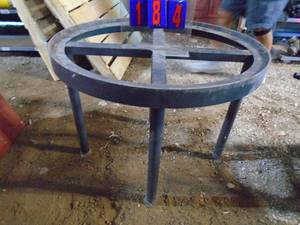 Heavy metal oval stand. 36 x 28. As shown.
