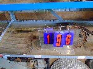 Items on second shelf with fork, lodge plates & folkart. As shown.