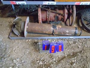Items on bottom shelf with fire valves, pulley & etc. As shown.