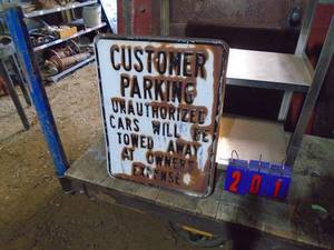 Customer parking tin sign. As shown.