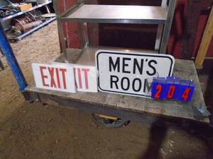 Mens room tin sign with plastic exit signs. As shown.