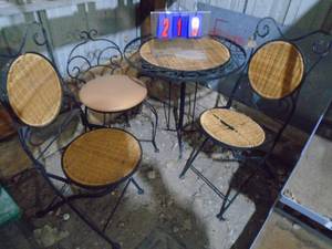 Folding wicker table & chairs. As shown.