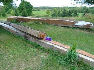 Large timbers. Approx 27 x 18 x 9. Pettibone will be on site to load. As shown.