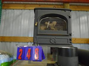 Dovre propane gas free standing heater with steel pipes. Works Fines. As shown.