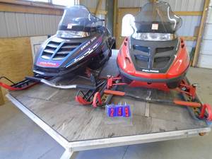 2000 Polaris 600 XC Deluxe & 1996 Polaris Indy 500 with sled bed trailer. As shown. PAYMENT FOR THIS ITEM IS A CASH ONLY SALE. NO CREDIT WILL BE ACCEPTED AT ALL FOR ANY PAYMENT TOWARDS THIS LOT. THIS ITEM HAS A RESERVE.