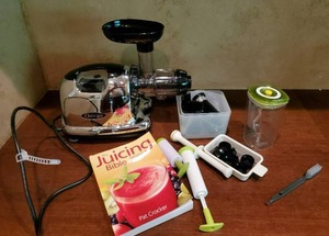 Omega Juicer And Vacucraft Food Storage Container