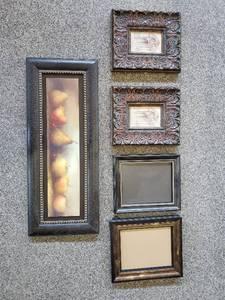 Collection Of Artwork And Frames