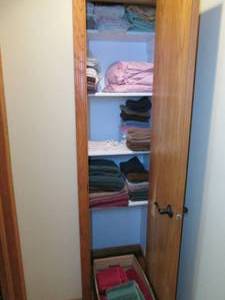 lot 79 image: Closet of towels and linens...
