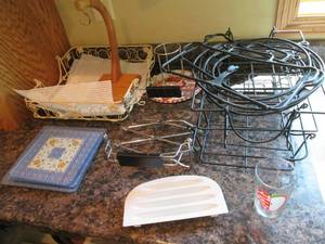 lot 93 image: Racks, glass hot pads, beer can chi...