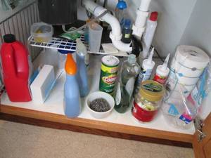 lot 96 image: Contents below sink includes cleane...
