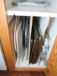lot 99 image: Contents of cupboard includes cooki...