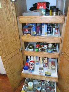 lot 101 image: Contents of cupboard includes roast...