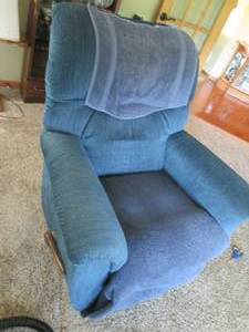 lot 148 image: Cloth recliner, has towels pinned t...
