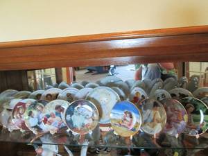lot 152 image: 25 small collectible plates on stan...