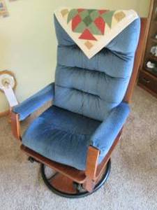 lot 159 image: Padded swivel rocking chair...