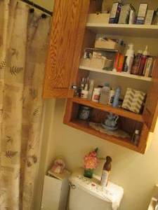 lot 176 image: Contents of medicine cabinet, decor...