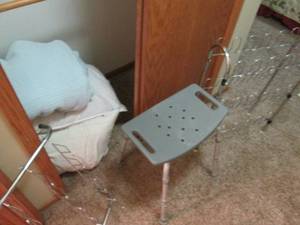 lot 184 image: Metal shoe racks, shower chair, pil...