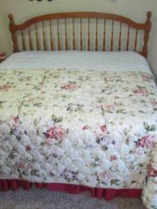 lot 4 image: King size wood beefcake and bedding...