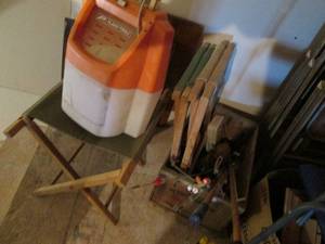 lot 200 image: Ice fishing poles, bait bucket, can...