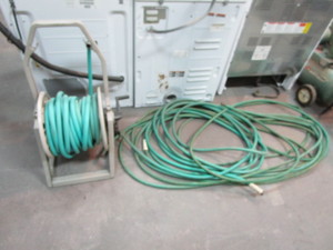 lot 311 image: Garden Hose Reel & Garden Hoses