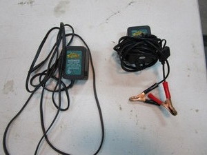 lot 291 image: (2) Battery Tenders (1 missing clamps)
