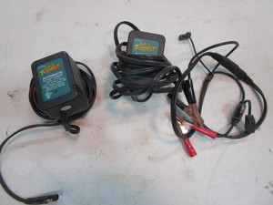 lot 292 image: (2) Battery Tenders (1 missing clamps)
