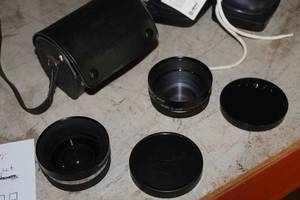 lot 143 image: Lot of (2) Yashikor i with Cases - Wide Angle 14, Telephoto 14