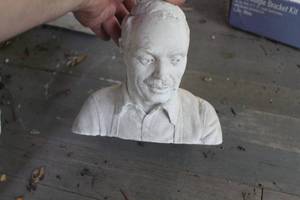 lot 207 image: Mans Face Stone Sculpture